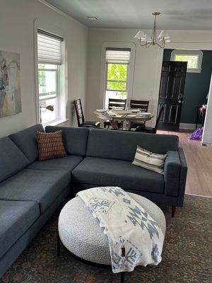 Color swatches of fabric in earthy tones: beige, olive green, gray, white, mustard yellow, rust orange, plus pattern textures